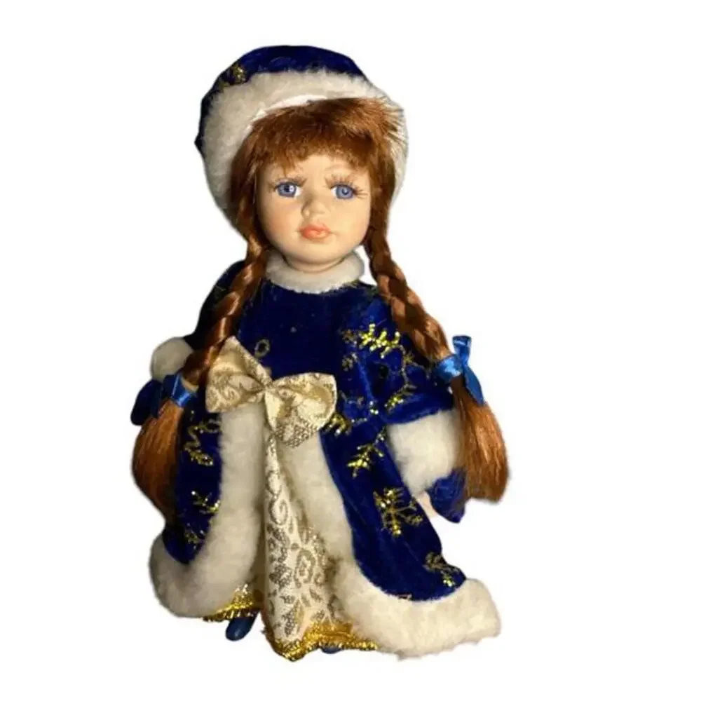 8” porcelain doll with no papers or box. T229